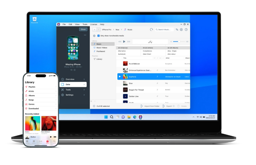 Computer and phone displaying a music library transfer in progress